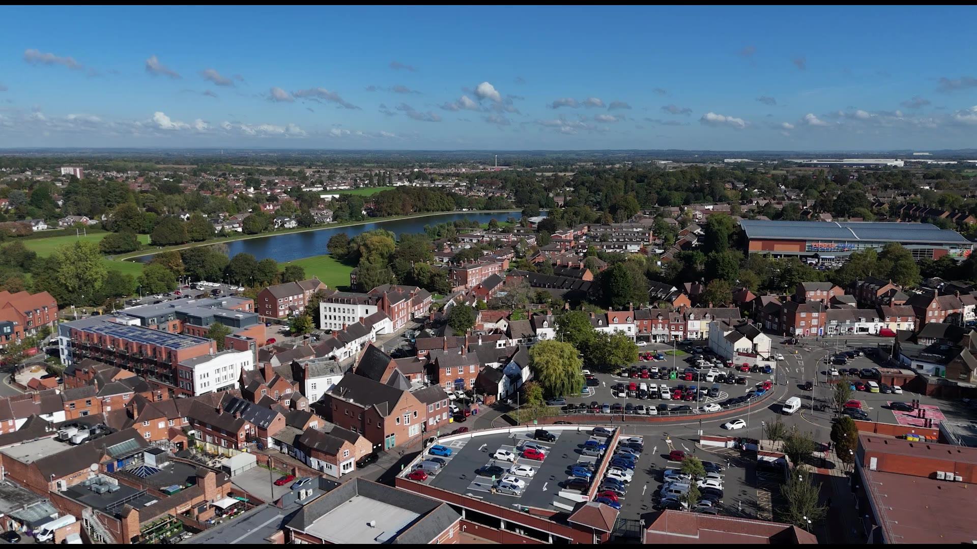Lichfield city centre and cathedral spires from the air