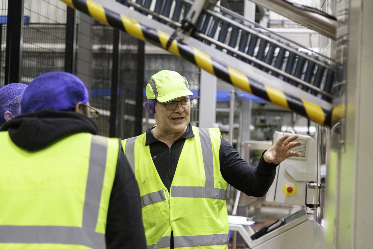 Manager explaining the production process during a walkround