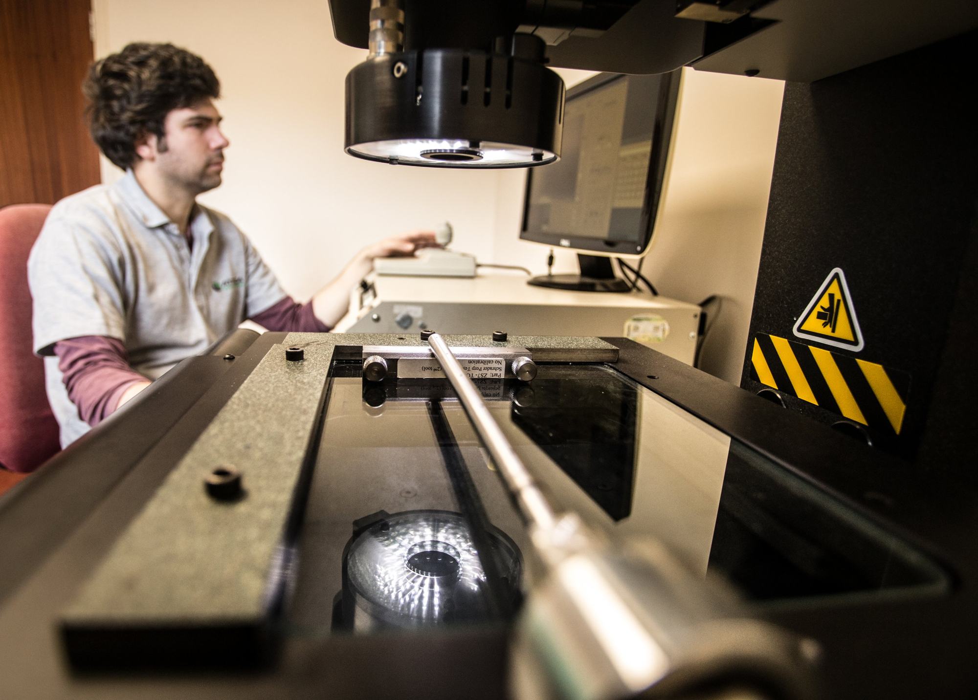 Engineer at a precision measuring machine