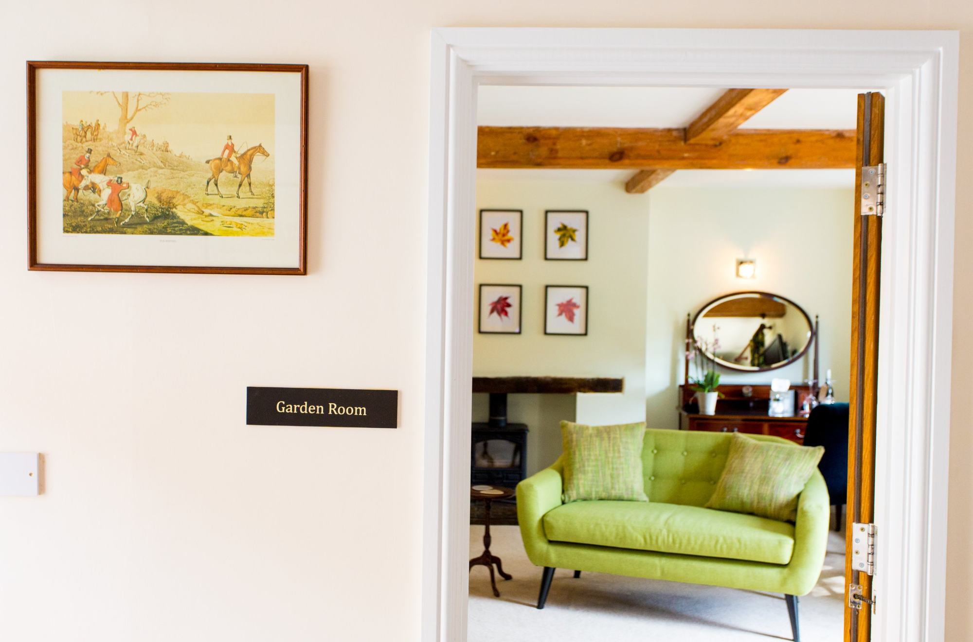 Guest room interior seen through a doorway
