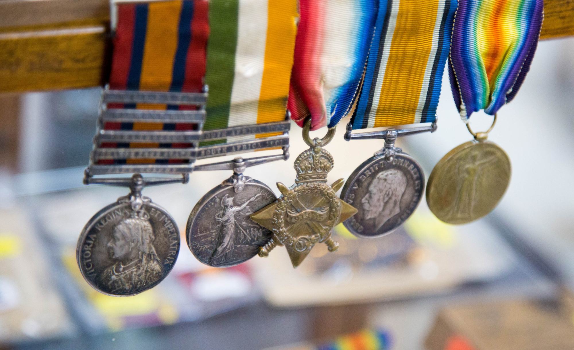 Close-up of a row of campaign medals and ribbons